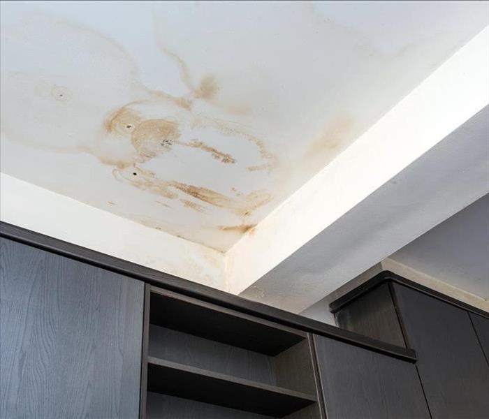 Roof leakage, water damaged ceiling roof and stain on ceiling